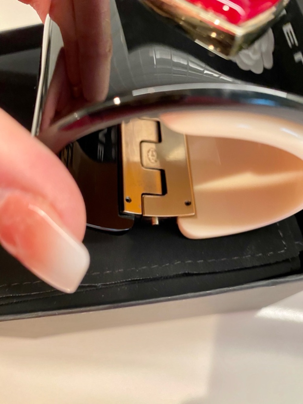 CHANEL Black and White Resin Cuff with Red Heart CC Accent - Picture 5 of 11